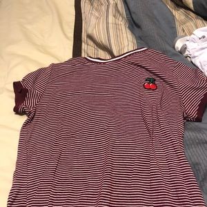 Red and white striped teeshirt.